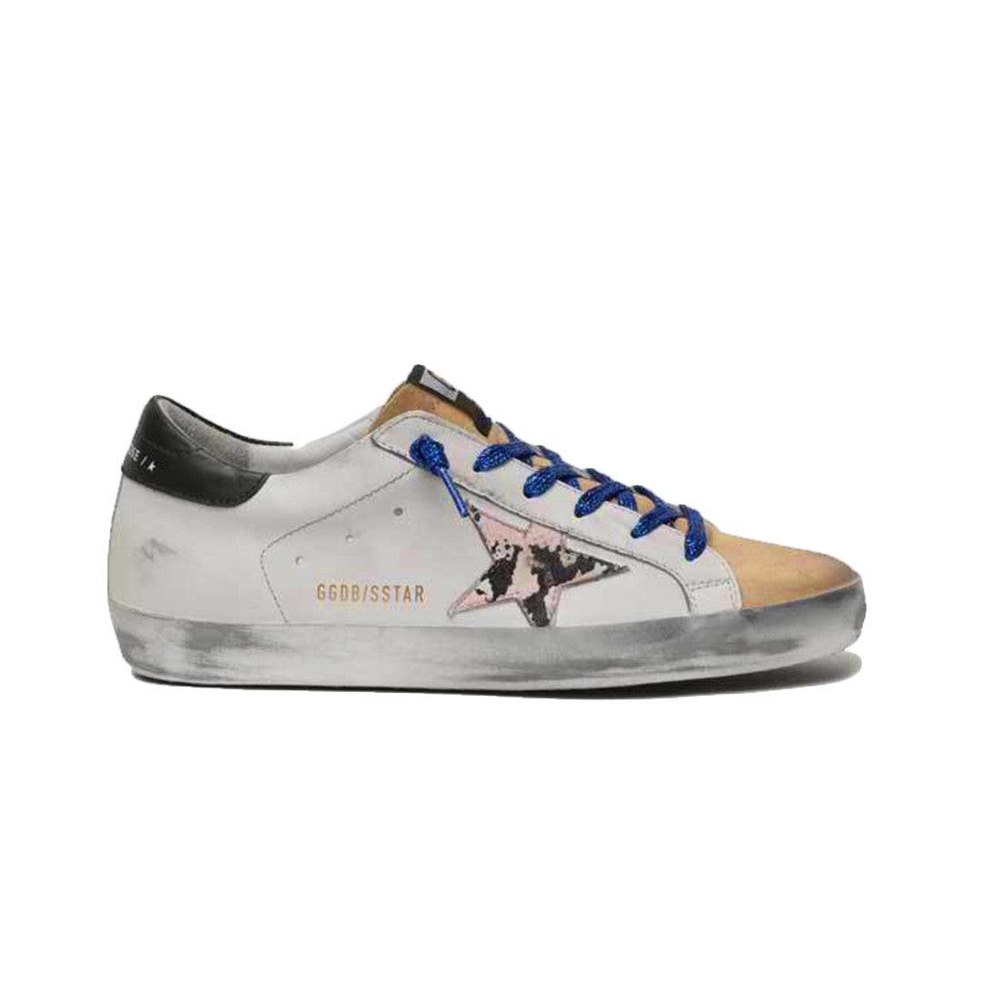 Photo of the white, cappuccino, and pink Superstar Golden Goose sneakers sold by Green Envy.