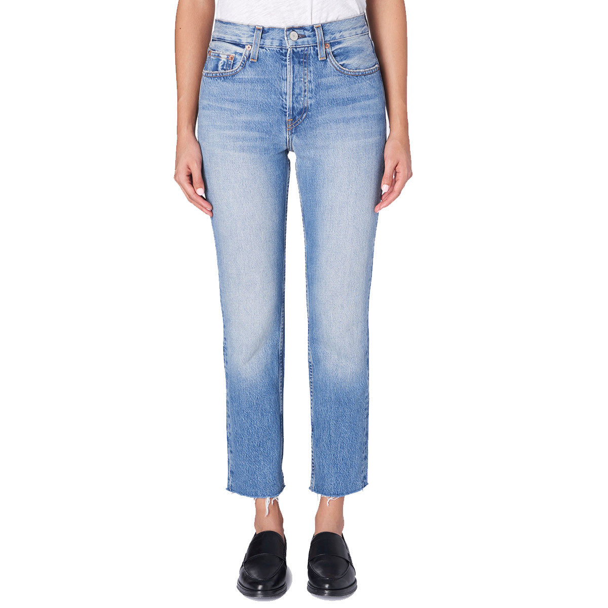 A front-facing photo of a model wearing Trave Denim’s Constance High-Rise jeans sold by Green Envy.
