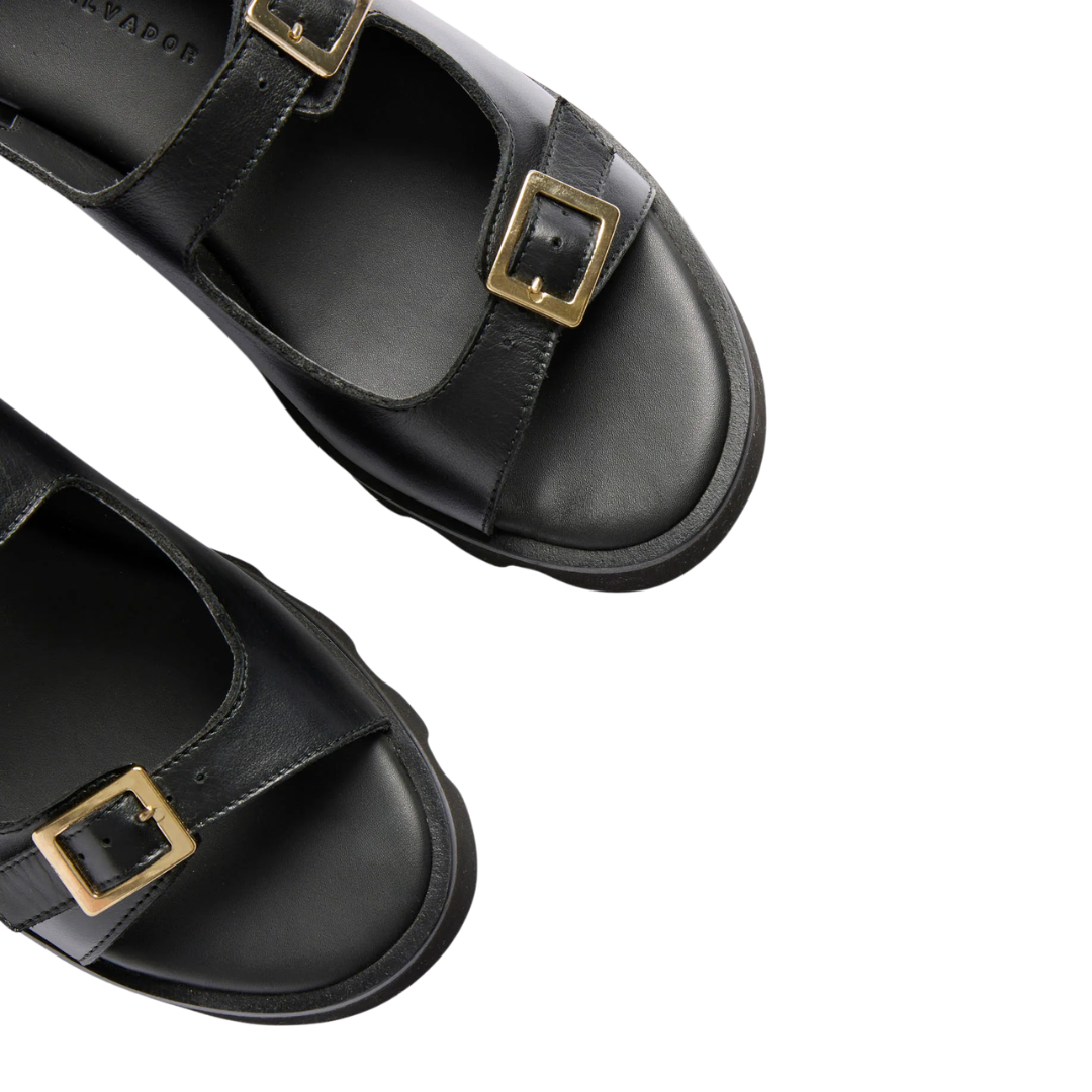 Mindy Lug Sole Sandal in Black Calf