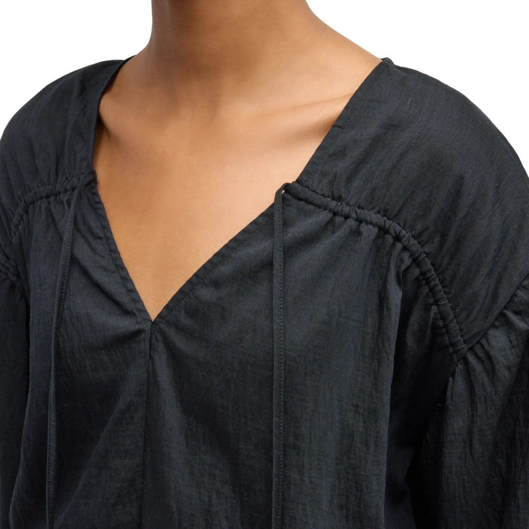 Abra Long-Sleeve Peplum-Hem Blouse in Black