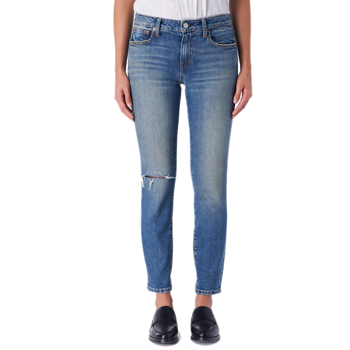 A front-facing photo of a model wearing the Trave Sophie Slim-Straight jeans sold by Green Envy.
